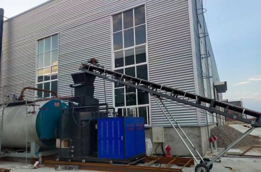 Gas fired steam boiler covered into biomass fired 